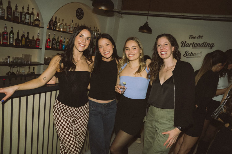 Bachelorette party group with cocktails at Fine Art Bartending School Vancouver